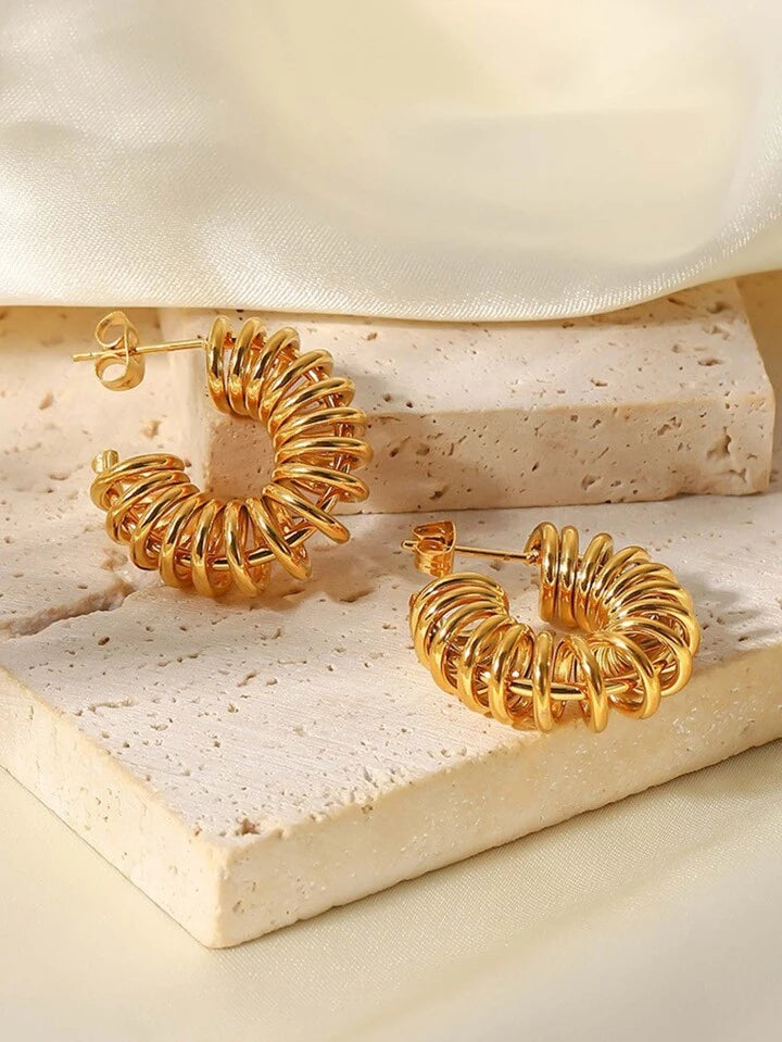 Best hoop earrings with oval shapes for a unique and elongated design-Beautiful Gold Statement Earrings