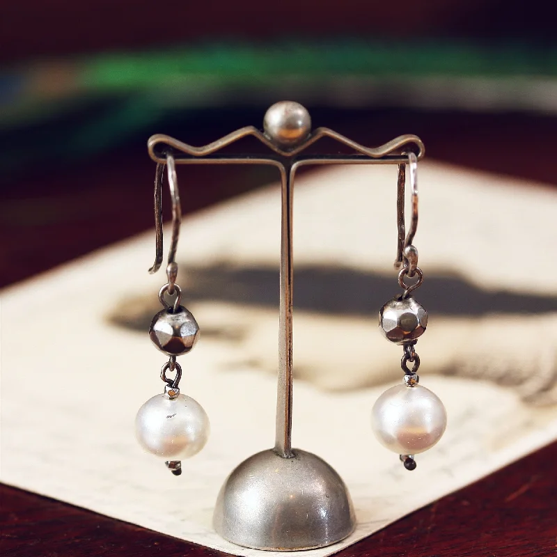 Hoop earrings with heart-shaped frames for a romantic and feminine look-Cut Steel and Hand Blown Glass Pearl Earrings