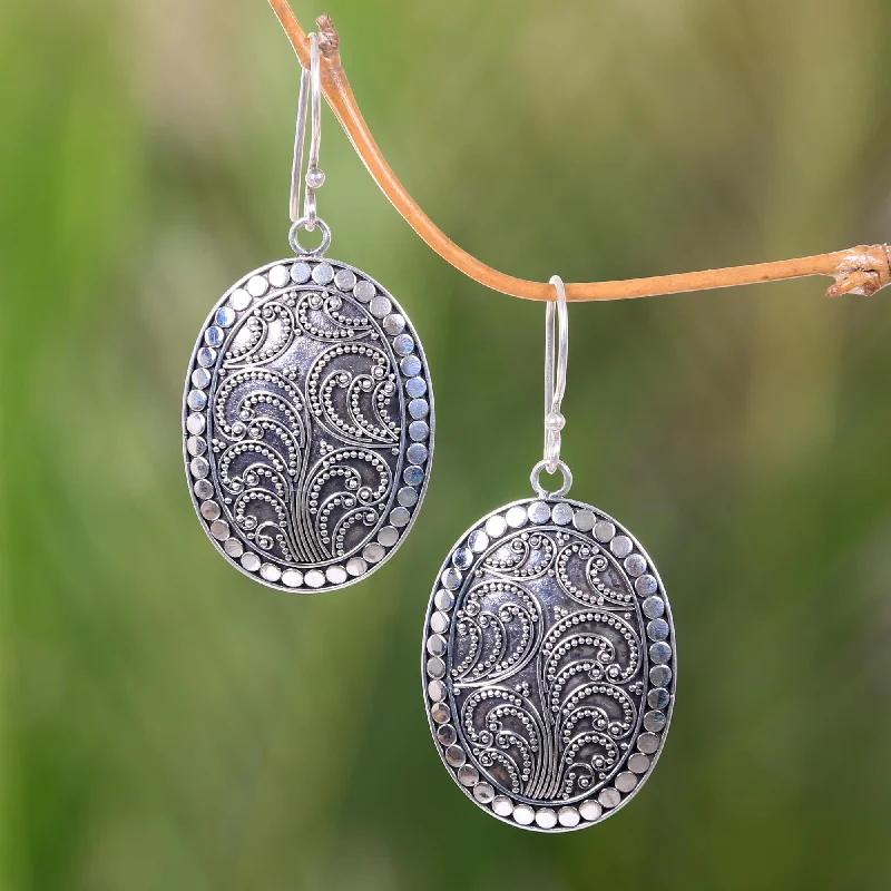 Hoop earrings with multi-tone finishes for a colorful and layered effect-Fern Connections Handcrafted Sterling Silver Oval Dangle Earrings from Bali