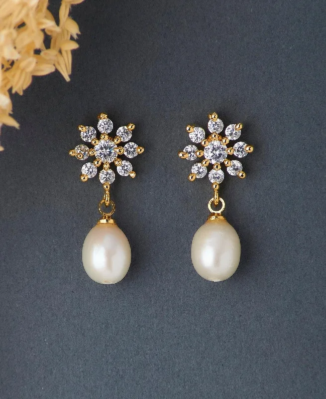 Best hoop earrings with angel wing accents for a spiritual and meaningful design-Floral Stone Studded Pearl Earring