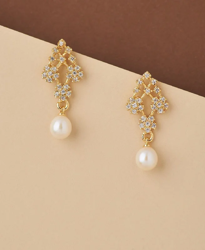 Hoop earrings with oversized pearl accents for a statement-making look-Floral Stone Studded Pearl Earring