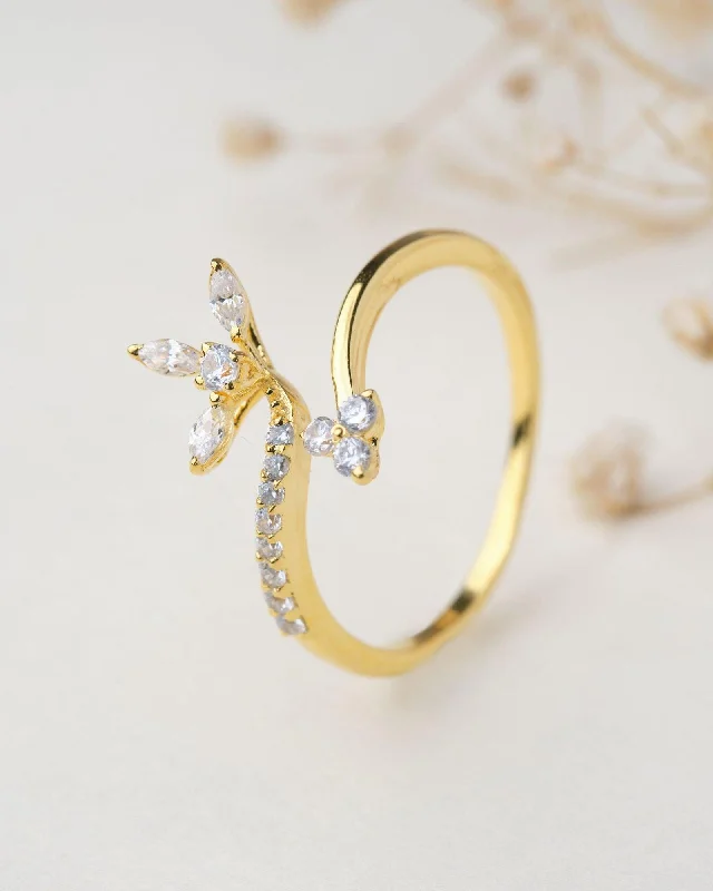 Best hoop earrings with butterfly motifs for a playful and whimsical appearance-Laya Twirl 18Kt Gold & Diamond Ring