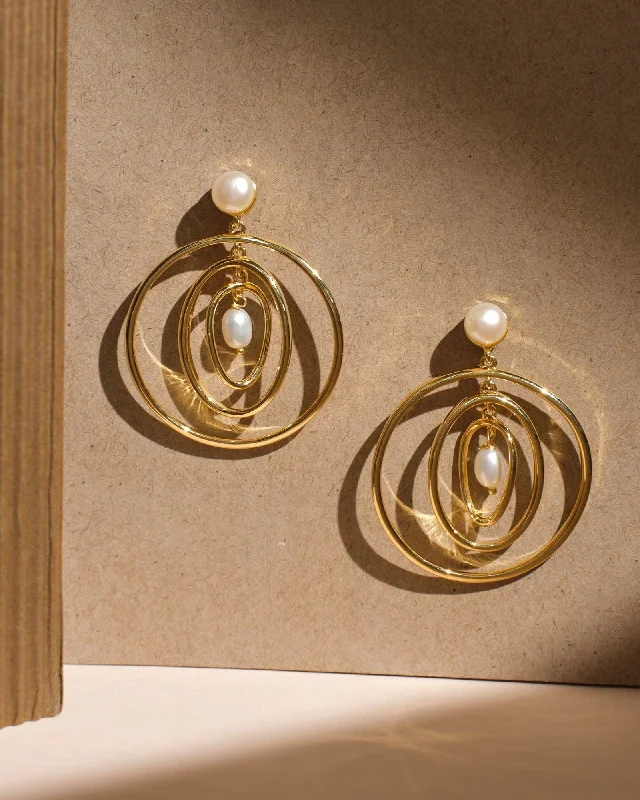 Best hoop earrings with floral designs for a feminine and delicate look-Power Of Flexibility Pearl Earrings