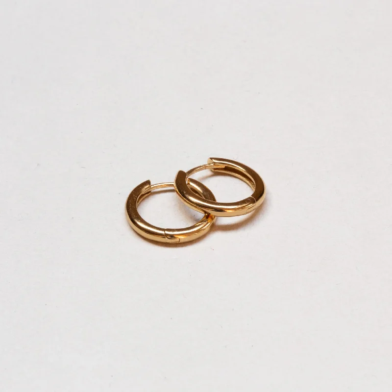 Best hoop earrings with crescent-shaped designs for a bold, moon-inspired style-Simple Gold Huggie Hoop Earrings