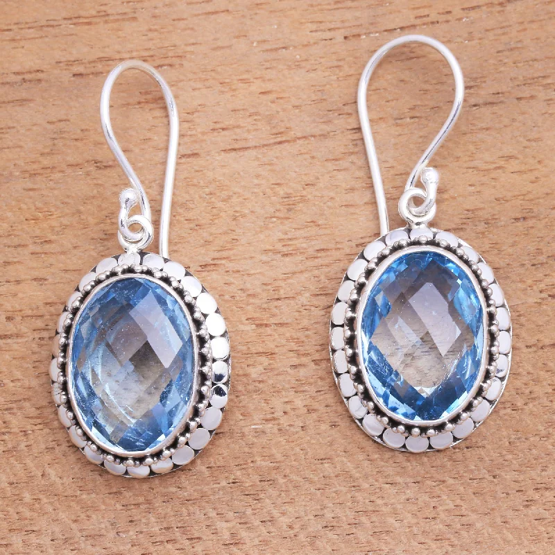 Best hoop earrings with delicate chain details for a trendy and stylish design-Sparkling Lake 9-Carat Faceted Blue Topaz Dangle Earrings from Bali