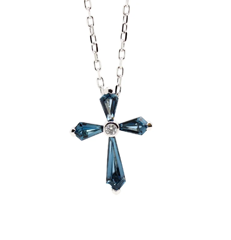 Best necklaces and pendants with opal and gold for a vibrant, luxurious contrast-Blue Topaz & Diamond Cross Pendant