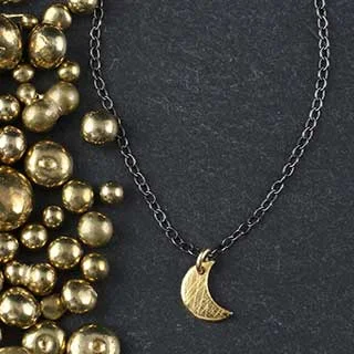 Best necklaces and pendants with glowing moonstone for an ethereal glow-Tiny Crescent Moon Necklace