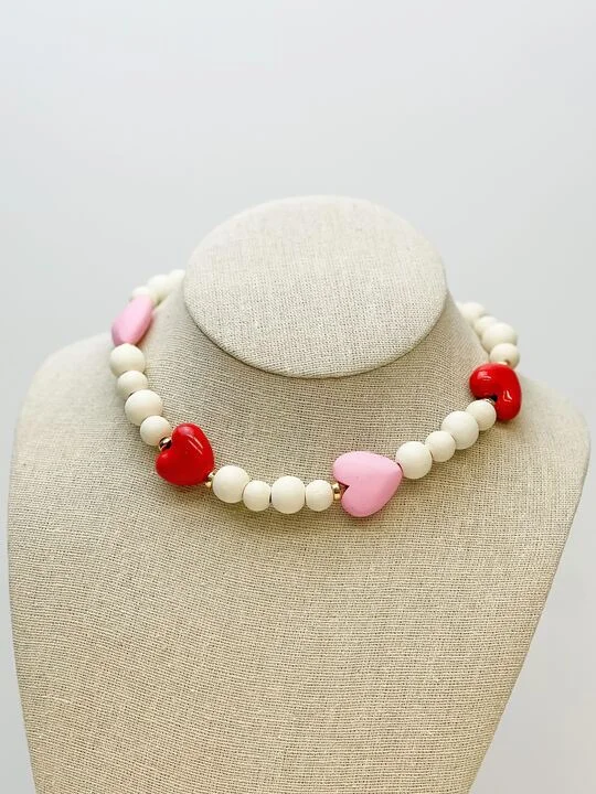 Best necklaces and pendants with intertwined designs for a symbol of unity-Hearts & White Bead Necklace