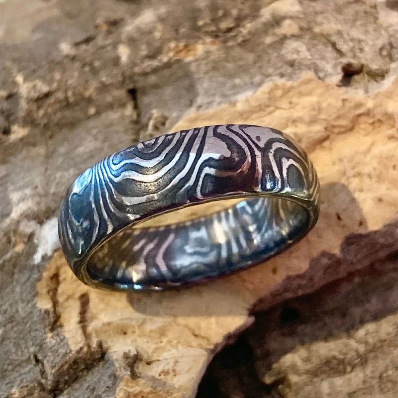 Rings with blue quartz for cool tones -Woodgrain Darkened Damascus Steel Mokume Ring